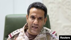 Saudi-led coalition spokesman, Colonel Turki al-Malki, speaks during a news conference in Riyadh, Saudi Arabia, March 22, 2021.