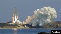 An H3 rocket carrying a land observation satellite lifts off from the launching pad at Tanegashima Space Center on the southwestern island of Tanegashima, Kagoshima Prefecture, southwestern Japan March 7, 2023, in this photo taken by Kyodo. 