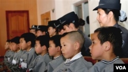 Anak-anak korban perdagangan manusia di Biro Keamanan Publik Panglong di Kunming, provinsi Yunnan (foto: dok).