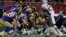 Timovi Los Angeles Rams i New England Patriots u prvom poluvremenu finalne utakmice u Atlanti