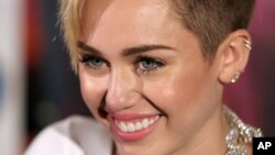 Recording artist Miley Cyrus attends an album release signing event, on Oct. 8, 2013 at Planet Hollywood in New York.