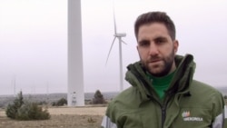 Iberdrola engineer Alonso Soberon says the sharp price drop for wind makes it competitive against fossil fuels, and one solution to fighting climate change. (Lisa Bryant/VOA)