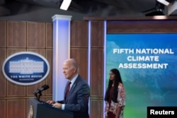 FILE —U.S. President Joe Biden delivers remarks on the White House initiative on climate change, at the White House in Washington, November 14, 2023.