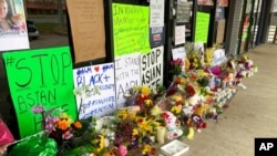 A make-shift memorial in Acworth, Ga., in the aftermath of shootings, March 19, 2021.