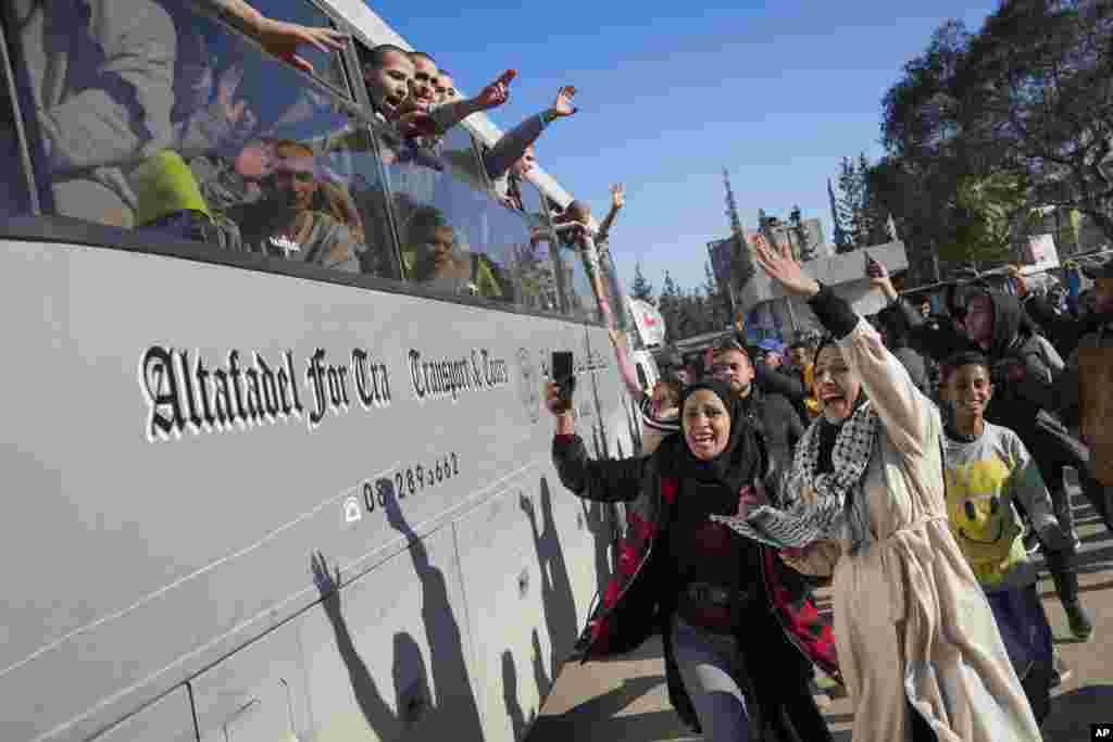 Freed Palestinian detainees are greeted after being released from an Israeli prison following a ceasefire agreement between Hamas and Israel in Khan Younis, Gaza Strip.