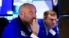 US Stocks Sink on New COVID Variant; Dow Loses 905 Points 