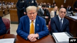 Former U.S. President Donald Trump attends his trial for allegedly covering up hush money payments linked to extramarital affairs, at Manhattan Criminal Court in New York on May 2, 2024.