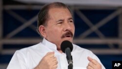 FILE - Nicaragua's President Daniel Ortega speaks during a ceremony marking the 34th anniversary of the withdrawal to Masaya, in Managua, July 5, 2013.