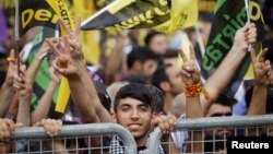 FILE - Supporters of the pro-Kurdish Peoples' Democracy Party (HDP) are seen at an election rally in Istanbul, Aug. 3, 2014.