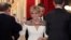 FILE - French First Lady Brigitte Macron attends a state dinner held at the Elysee Palace in Paris, France, March 19, 2018. 