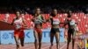 FILE - (L to R) Bahrain's Mimi Belete, Ethiopia's Genzebe Dibaba, Kenya's Mercy Cherono and Kenya's Irene Chepet Cheptai, compete in the women’s 5000m at the World Athletics Championships at the Bird's Nest stadium in Beijing, China, Aug. 27, 2015.