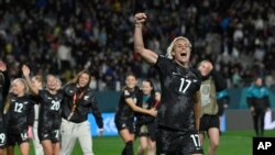 New Zealand's Hannah Wilkinson celebrates at the end of the Women's World Cup soccer match between New Zealand and Norway in Auckland, New Zealand, Thursday, July 20, 2023. New Zealand won the match 1-0. (AP Photo/Andrew Cornaga)