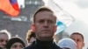 FILE - Russian opposition politician Alexei Navalny takes part in a rally in Moscow, Russia, Feb. 29, 2020. 