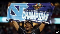 North Carolina's Kenny Williams celebrates after the finals of the Final Four NCAA college basketball tournament against Gonzaga, April 3, 2017, in Glendale, Arizona. North Carolina won 71-65. 
