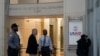 Security personnel work, as the USAID building sits closed to employees after a memo was issued advising agency personnel to work remotely, in Washington, D.C., Feb. 3, 2025.