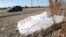 FILE - A plastic bag litters the roadside. 