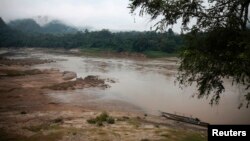 FILE - A view of the Salween River is seen from a small Thai-Karen village on the Thai side of the river, Nov. 17, 2014.