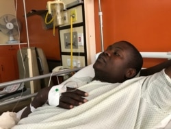 Tatenda Mombeyarara, the leader of the activist group Citizens Manifesto, is recovering in a private hospital in Harare, Zimbabwe, Aug. 28, 2019. (Photo: C. Mavhunga / VOA)