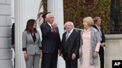 US Vice President Mike Pence and wife Karen Pence, left, meet with Irish President Michael D Higgins and his wife Sabrina at Aras an Uachtarain the official residence of the Irish President , Dublin, Ireland, Sept. 3, 2019.