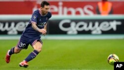 Messi a lokacin wasansu da Reims