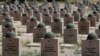 FILE - Graves of Russian World War II soldiers are seen in a cemetery in Rossoshka, near Volgograd, formerly Stalingrad, Russia, June 17, 2018.