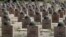 FILE - Graves of Russian World War II soldiers are seen in a cemetery in Rossoshka, near Volgograd, formerly Stalingrad, Russia, June 17, 2018.