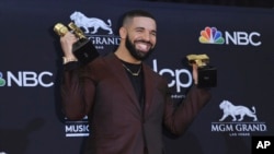 Drake poses in the press room with his awards at the Billboard Music Awards on May 1, 2019, at the MGM Grand Garden Arena in Las Vegas. 