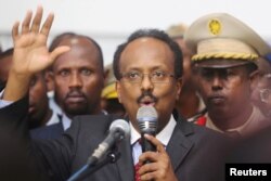 FILE - Somalia's newly-elected President Mohamed Abdullahi Farmajo addresses lawmakers after winning the vote at the airport in Somalia's capital Mogadishu, Feb. 8, 2017.