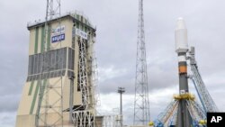 FILE - Russia's Soyuz-ST-B spacecraft is shown to the media at the Guiana Space Center in Kourou, French Guiana, May 4, 2011. 