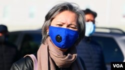 Mu Sochua, former Vice President of the Cambodia National Rescue Party (CNRP) leaves the Cambodian consulate in Lowell, Massachusetts, on December 22, 2020. (Pin Sisovann/VOA Khmer)