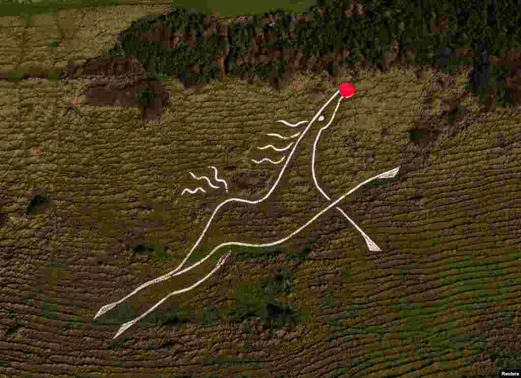 A drone view shows the Folkestone White Horse with a red nose ahead of Christmas, in Folkestone, Britain.