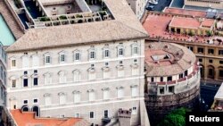 FILE - An exterior view of the tower of the Institute for Works of Religion (IOR) in Vatican City, Italy. 