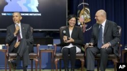 President Barack Obama, left, gets a reactions on his remarks from other panel members during a discussion as part of the White House Precision Medicine Initiative (PMI), in the South Court Auditorium in the Eisenhower Executive Office Building on the White House complex in Washington, Feb. 25, 2016. With Obama are Sonia Vallabh, center, Ph.D. student, Broad Institute of MIT and Harvard, and Howard Look, right, President, CEO, and Founder, Tidepool. 