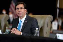 FILE - Defense Secretary Mark Esper, July 10, 2020.