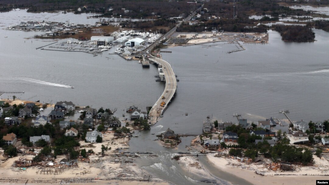 The view of storm damage over the Atlantic Coast in Seaside Heights, N.J., Wednesday, Oct. 31, 2012, from a helicopter traveling behind the helicopter carrying President Obama and New Jersey Gov. Chris Christie.