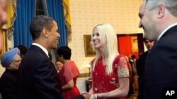 MIchaele and Tareg Salahi, greet President Barack Obama during State Dinner at white House.