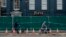 A police cordon and fence are placed outside a Zizzi restaurant near the area where former Russian double agent Sergei Skripal and his daughter were found critically ill following exposure to the Russian-developed nerve agent Novichok in Salisbury, England, March 13, 2018. 