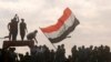 Iraqi Forces, Protesters Clash in Baghdad, Injuries on Both Sides 