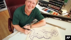 Pencipta Garfield Jim Davis menggambar karakter kartun ciptaannya di kantornya di Muncie, Indiana, 1998. (Foto: Dok)