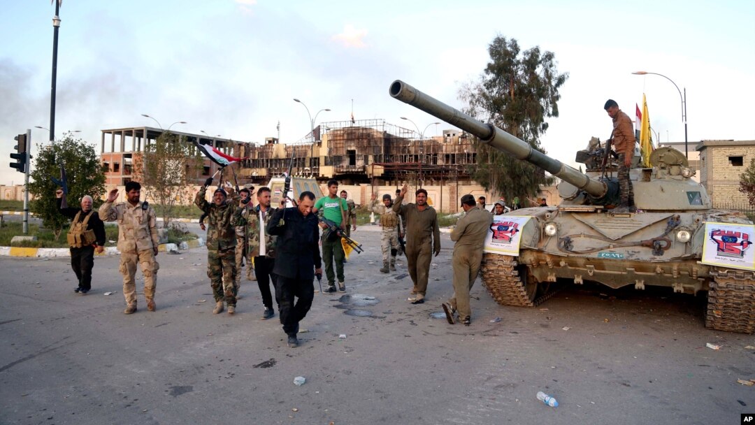 Iroq xavfsizlik kuchlari va shia jangchilari Tikrit g'alabani nishonlamoqda, 31-mart, 2015-yil