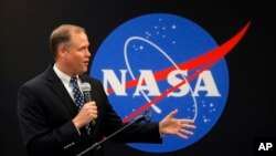 FILE - NASA Administrator James Bridenstine delivers remarks as he tours the NASA Michoud Assembly Facility in New Orleans, Aug. 13, 2018. 