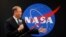 FILE - NASA Administrator James Bridenstine delivers remarks as he tours the NASA Michoud Assembly Facility in New Orleans, Aug. 13, 2018. 