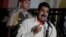 Venezuela's President Nicolas Maduro (R) talks to the media after his meeting with former Spanish prime minister Jose Luis Rodriguez Zapatero in Caracas, Venezuela, Oct. 31, 2016. 