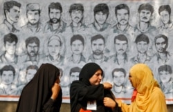 FILE - Relatives of missing Kashmiri men attend a sit-in protest in a park organized by the Association of Parents of Disappeared Persons (APDP) in Srinagar, Oct. 10, 2013.