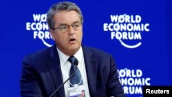 FILE - Roberto Azevedo, Director-General of the World Trade Organization (WTO), attends the World Economic Forum (WEF) annual meeting in Davos, Switzerland, Jan. 24, 2018.