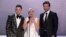 From left, Anthony Ramos, Lady Gaga and Bradley Cooper, nominated for outstanding performance by a cast in a motion picture, introduce a clip from their film "A Star Is Born" at the Screen Actors Guild Awards, in Los Angeles, California, Jan. 27, 2019.