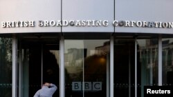 FILE - The entrance to the British Broadcasting Corporation (BBC) building is seen in White City in western London, Oct. 29, 2008. 