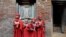 A group of Nepalese Buddhist boys are seen before they attend Bratabandha, a coming-of-age ceremony, in Kathmandu.