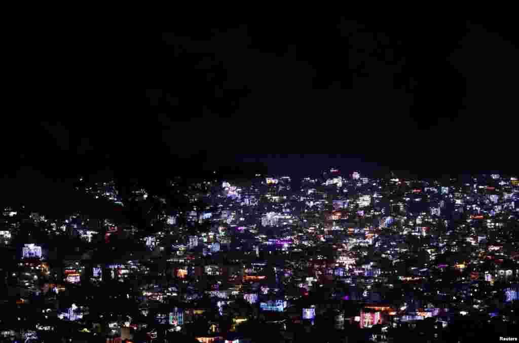 Houses are decorated with lanterns and lights during the Tihar festival, also called Diwali, the Hindu festival of lights in Kathmandu, Nepal, Oct. 26, 2019.
