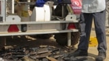 FILE - United Nations Mine Action Service (UNMAS) personnel destroy weapons at the U.N. Mission in South Sudan (UNMISS) base in Juba, Dec. 14, 2014.